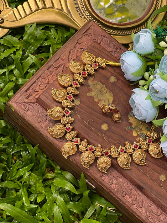 Lakshmi with mango necklace